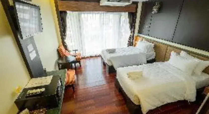 Bed in LANDMARK NAKHONPHANOM HOTEL Bed in LANDMARK NAKHONPHANOM HOTEL