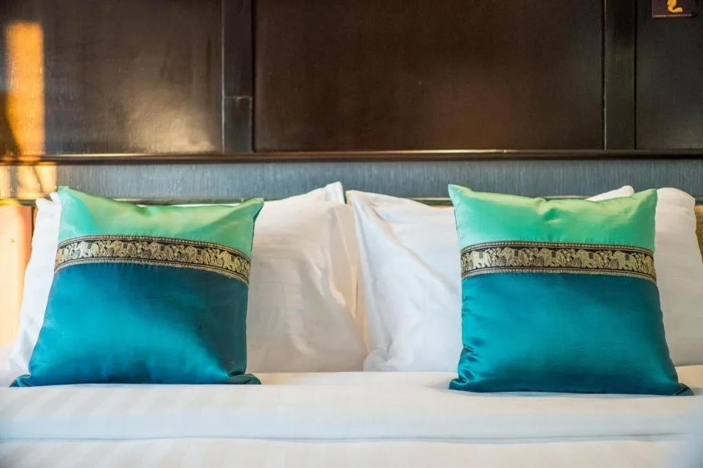 Bed in LANDMARK NAKHONPHANOM HOTEL