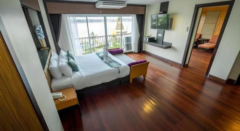 Bed in LANDMARK NAKHONPHANOM HOTEL