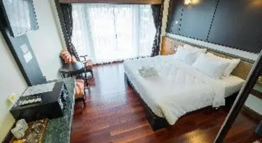 Bed in LANDMARK NAKHONPHANOM HOTEL Bed in LANDMARK NAKHONPHANOM HOTEL