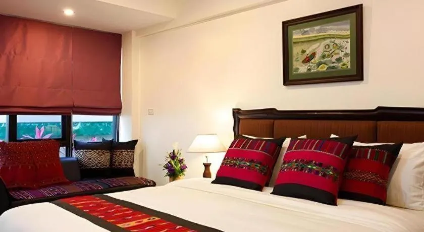 Bed in The Xym Hotel