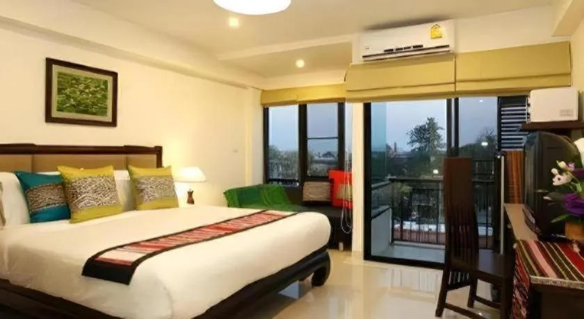 Bed in The Xym Hotel