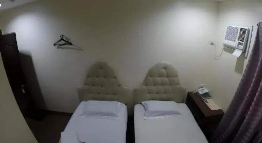 Bed in Rich Manor Pension House Bed in Rich Manor Pension House