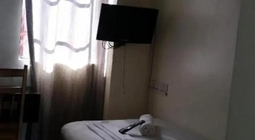 Bed in Rich Manor Pension House Bed in Rich Manor Pension House