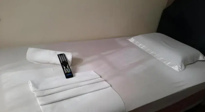 Bed in Rich Manor Pension House Bed in Rich Manor Pension House