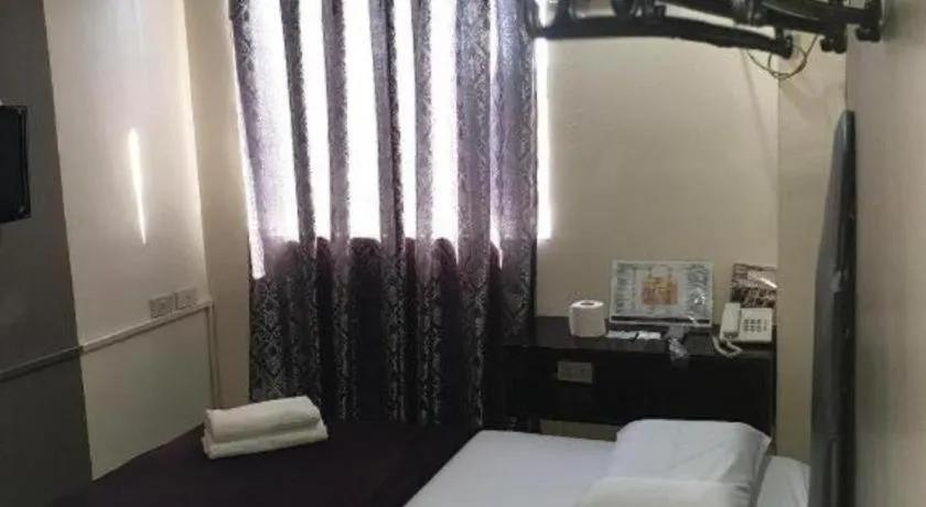 Bed in Rich Manor Pension House