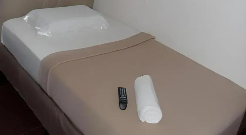 Bed in Rich Manor Pension House Bed in Rich Manor Pension House