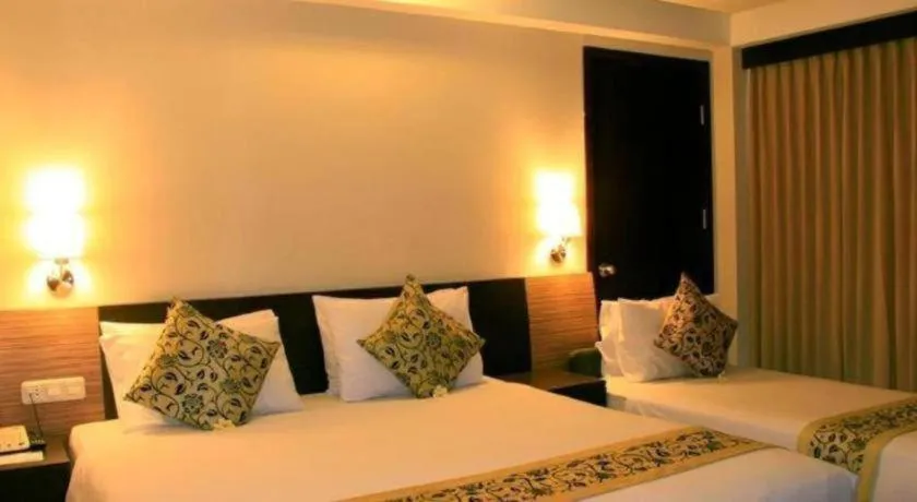 Bed in Losari Sunset Hotel
