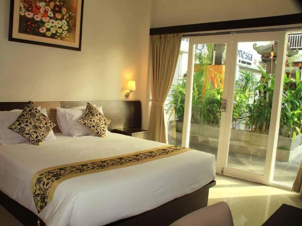 Bed in Losari Sunset Hotel