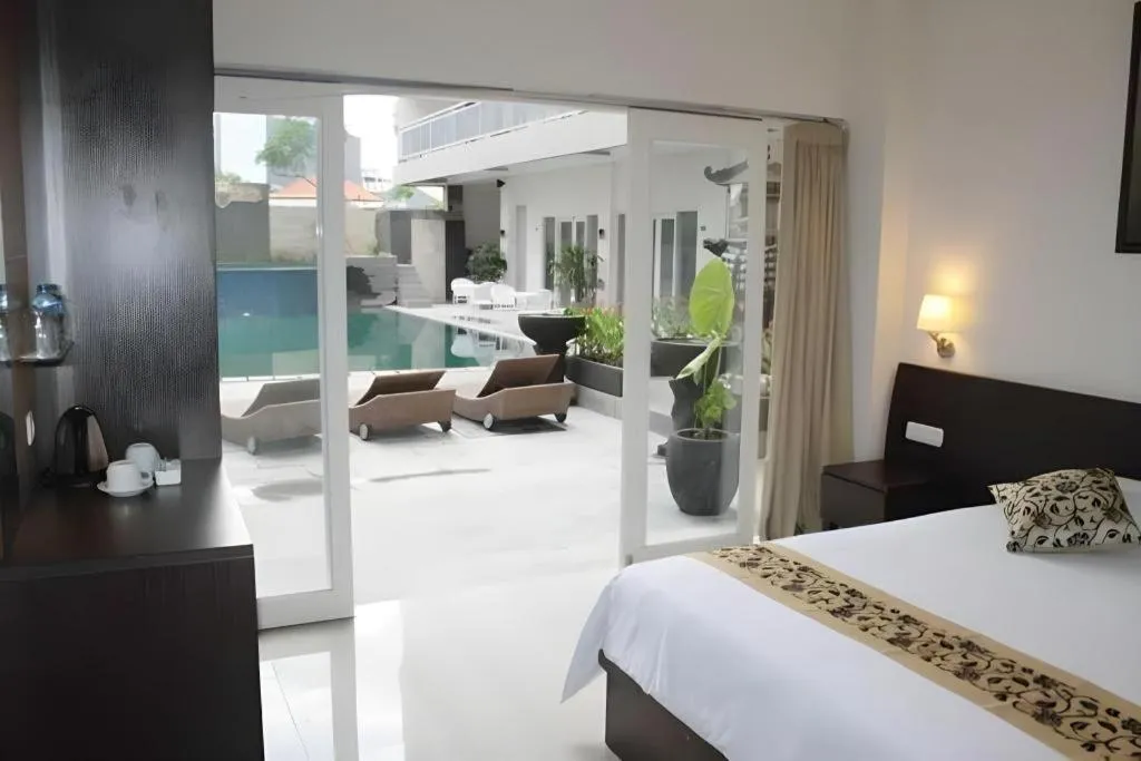 Bed in Losari Sunset Hotel