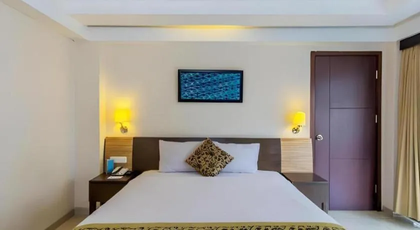 Bed in Losari Sunset Hotel