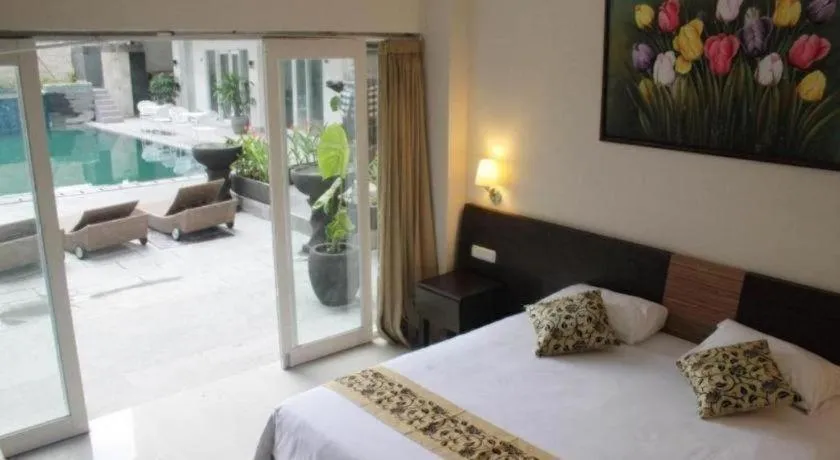 Bed in Losari Sunset Hotel