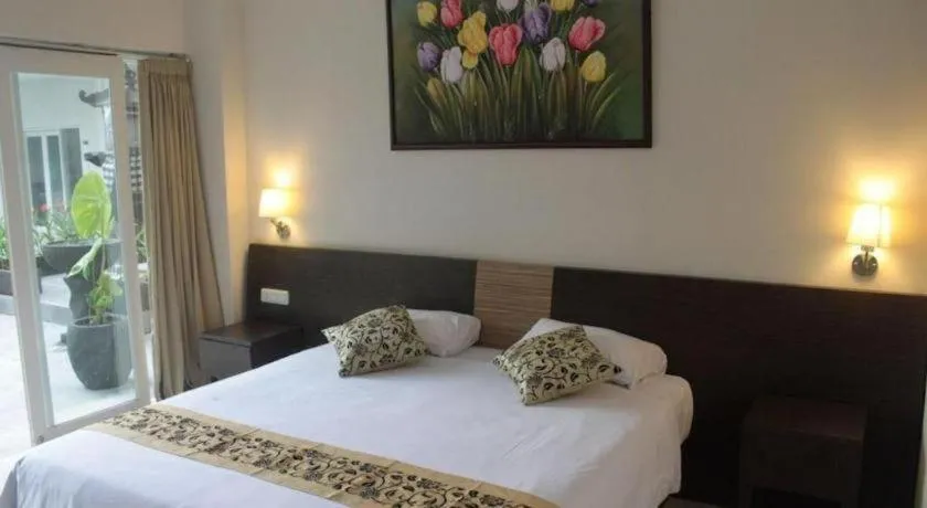 Bed in Losari Sunset Hotel