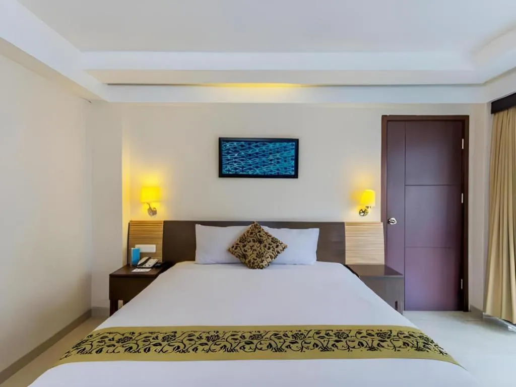 Bed in Losari Sunset Hotel