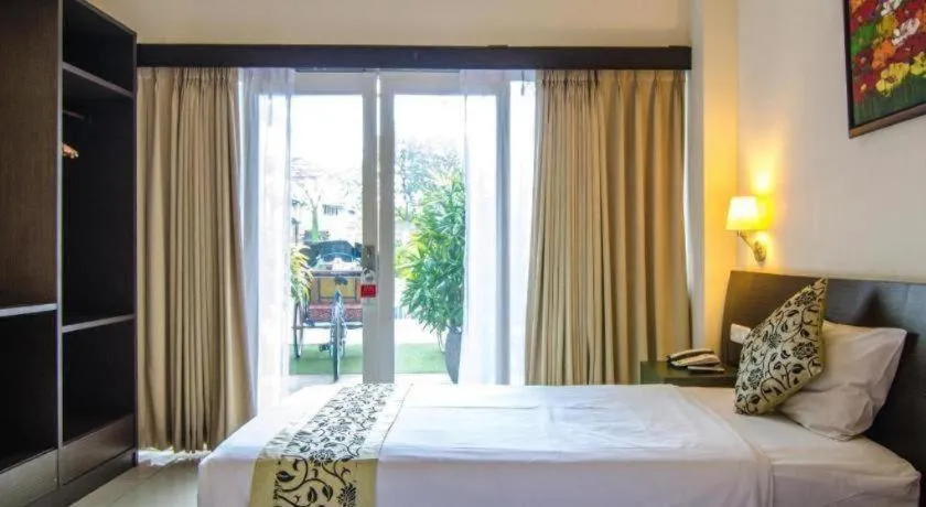 Bed in Losari Sunset Hotel