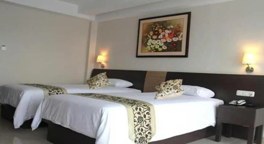 Bed in Losari Sunset Hotel