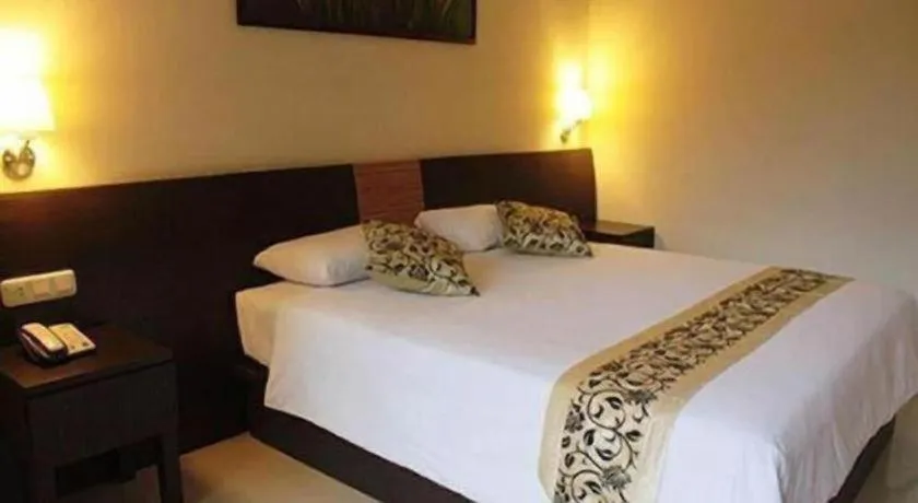 Bed in Losari Sunset Hotel