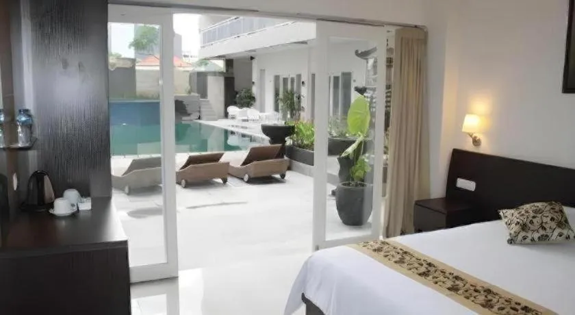 Bed in Losari Sunset Hotel