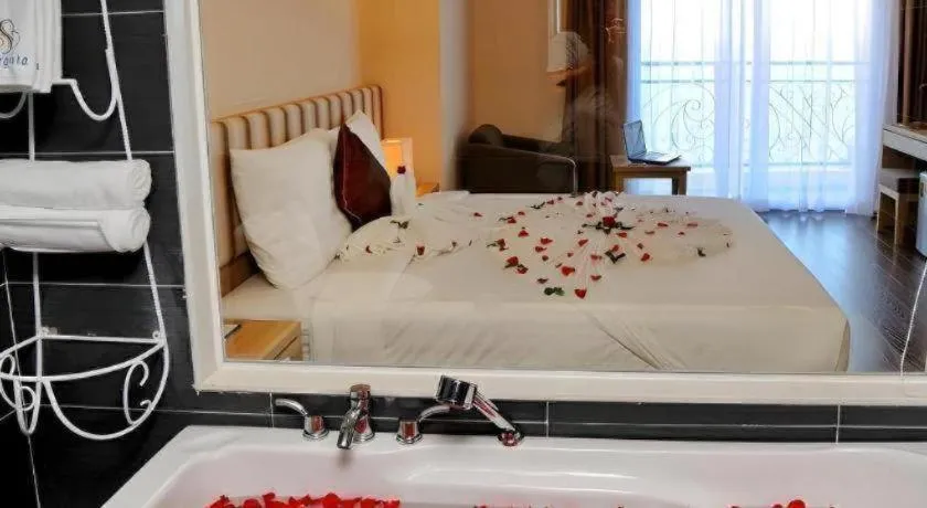 Bed in Begonia Nha Trang Hotel