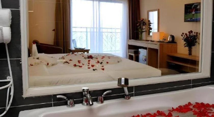 Bed in Begonia Nha Trang Hotel