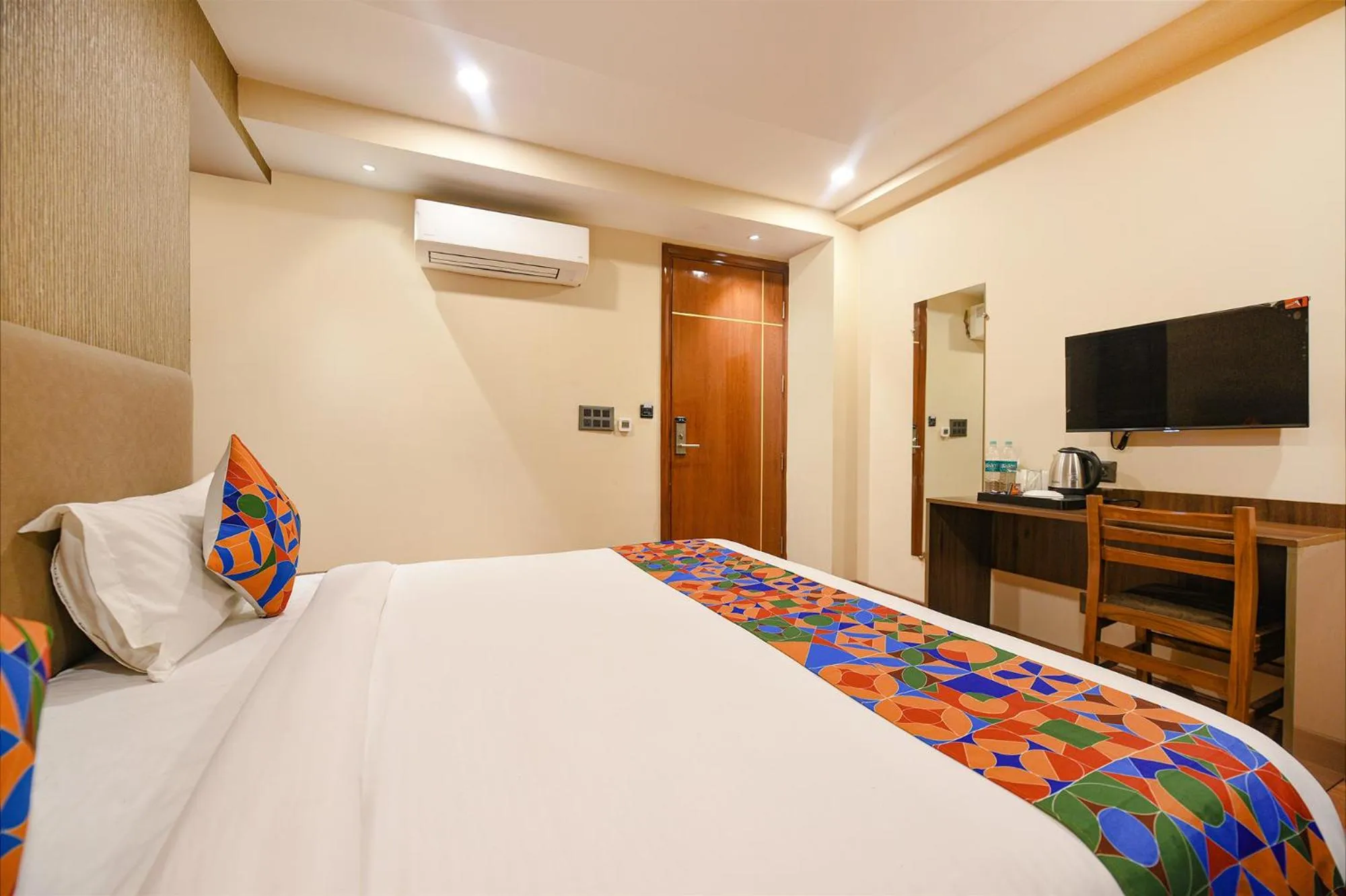 Bed in FabHotel Prime Blest Park Near Yashobhoomi Convention Centre