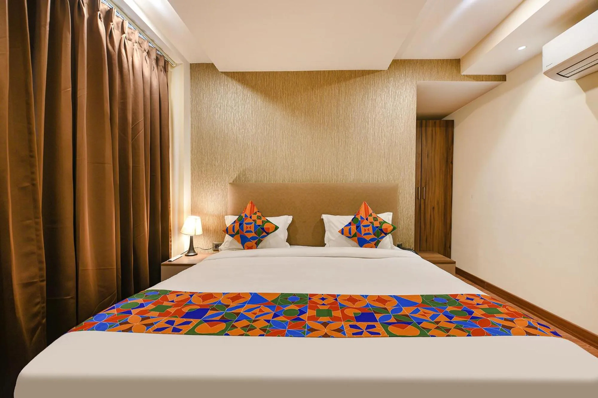 Bed in FabHotel Prime Blest Park Near Yashobhoomi Convention Centre