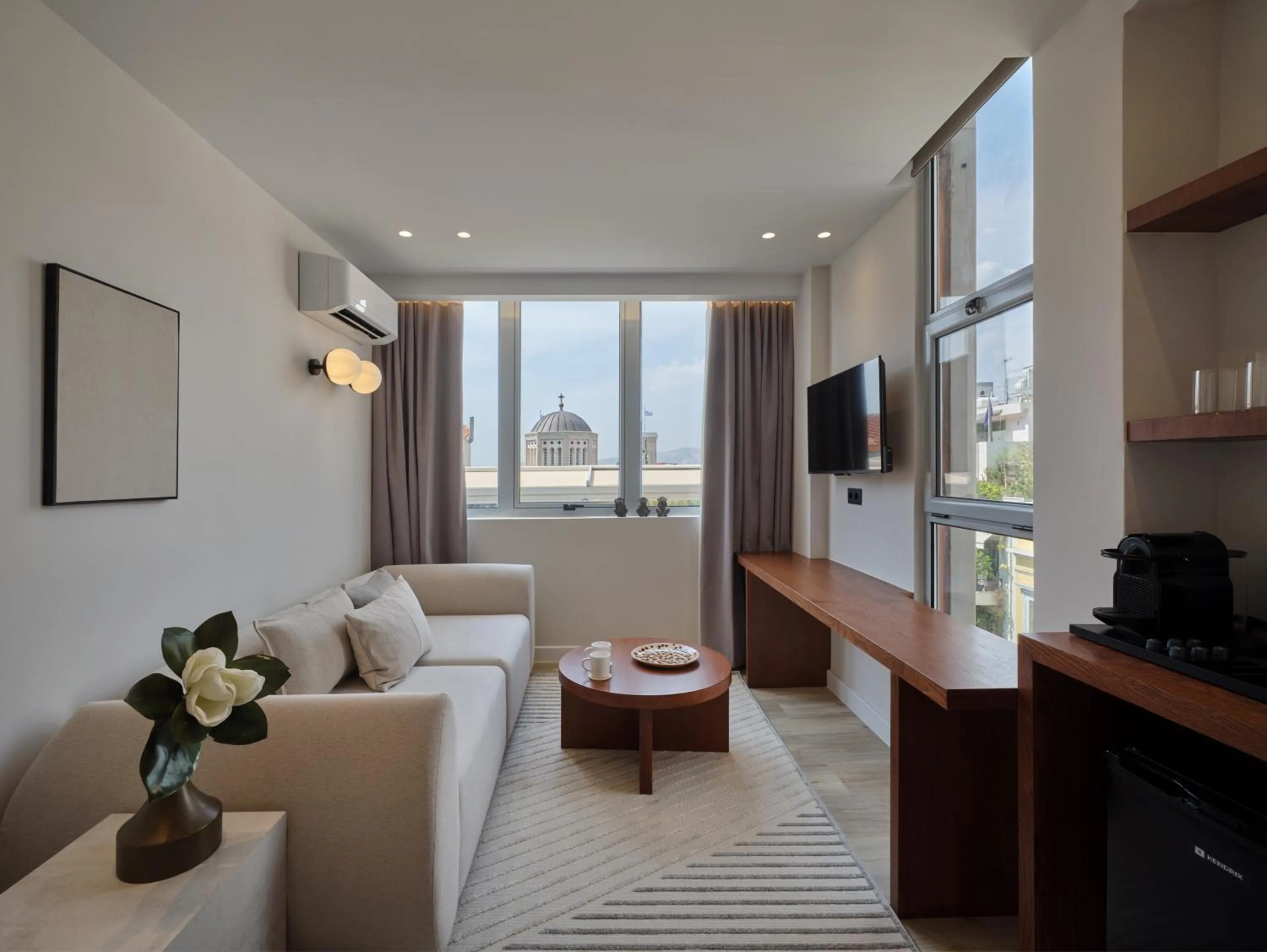 Seating area in Haya Athens Loftie Suites