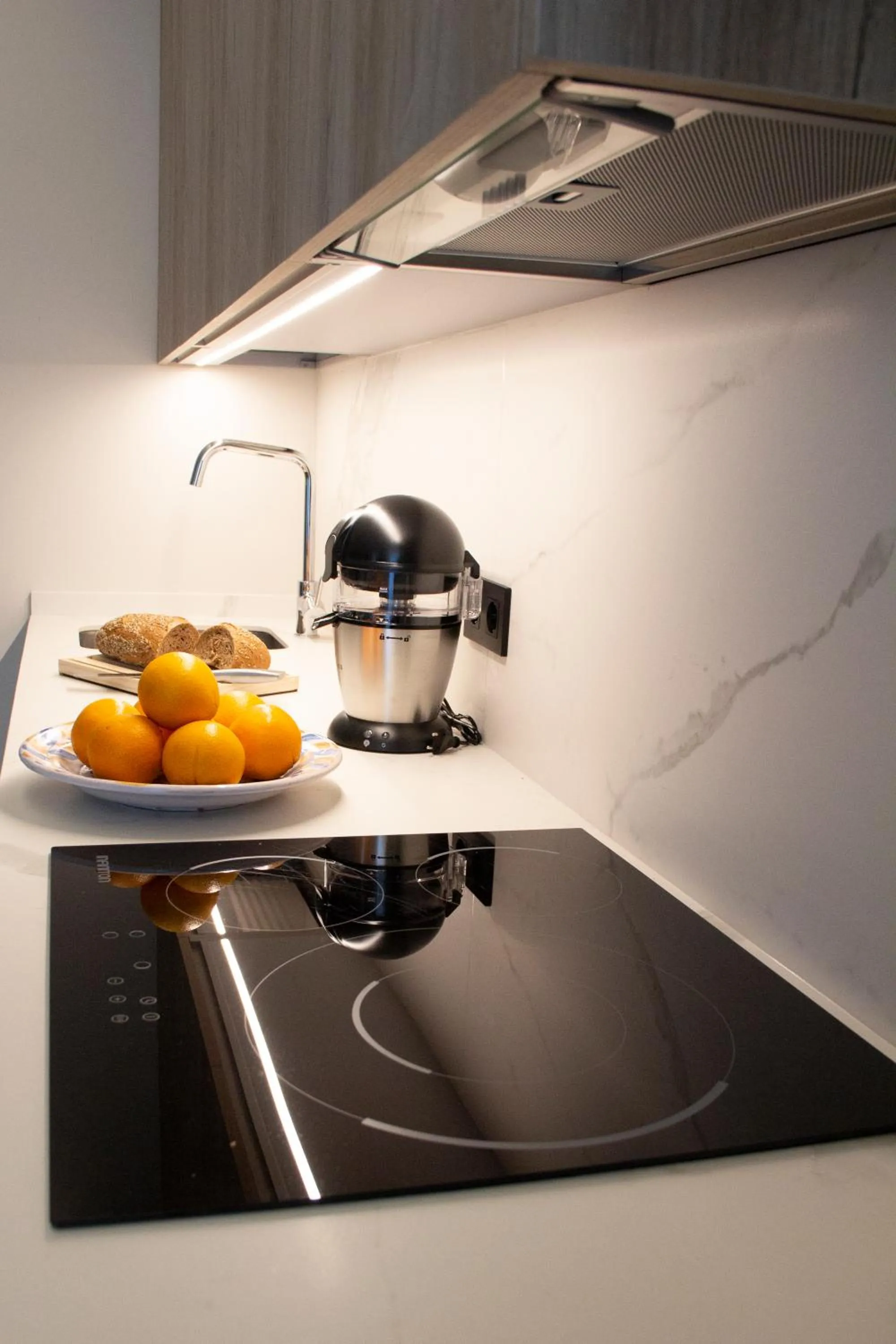 Kitchen or kitchenette in Puerta de la Ribera Suites