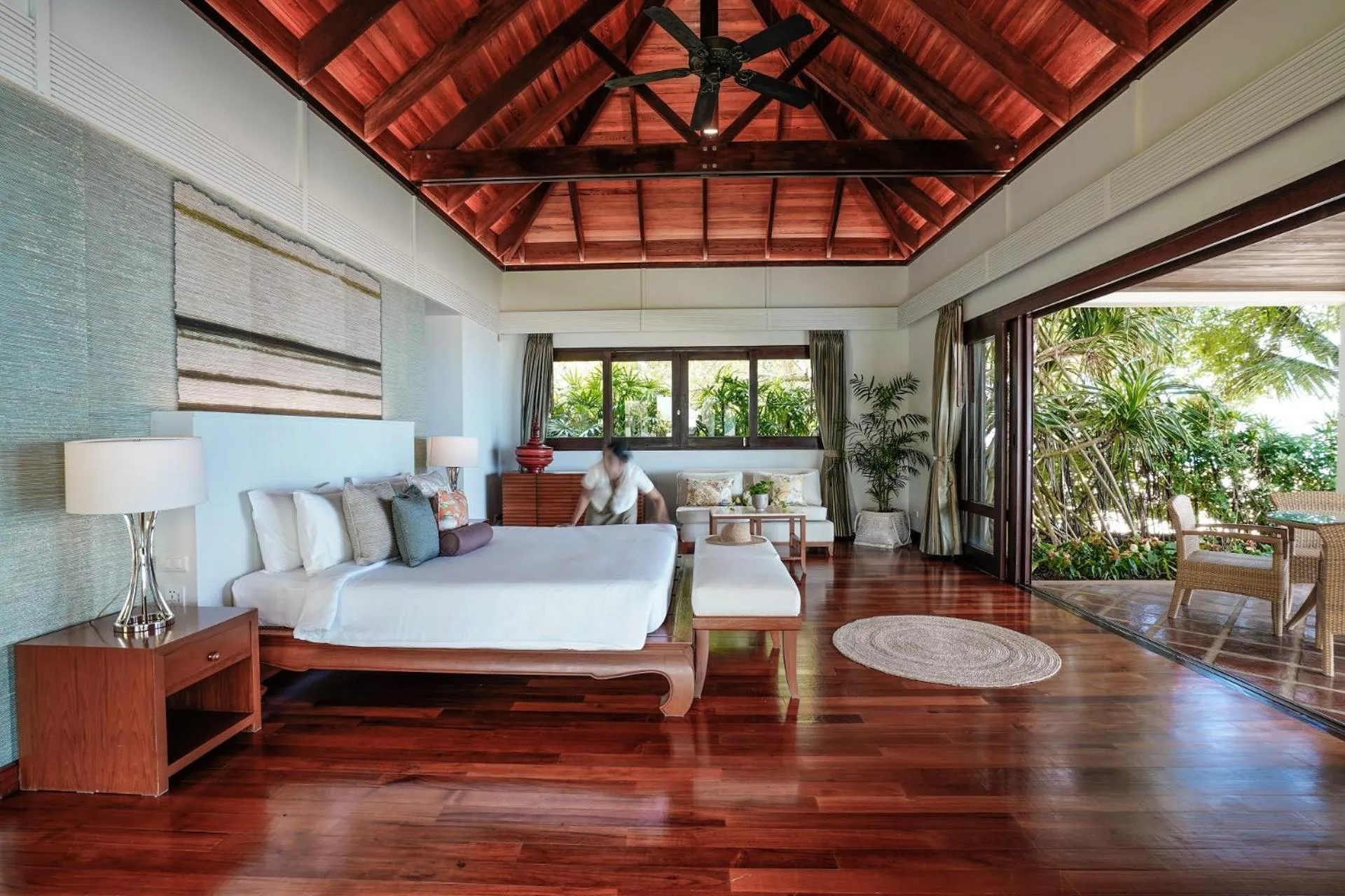 Bed in Miskawaan Beachfront Villas