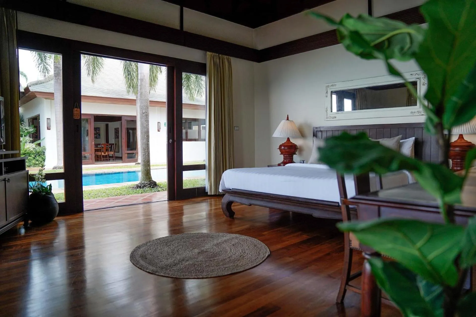 Bed in Miskawaan Beachfront Villas