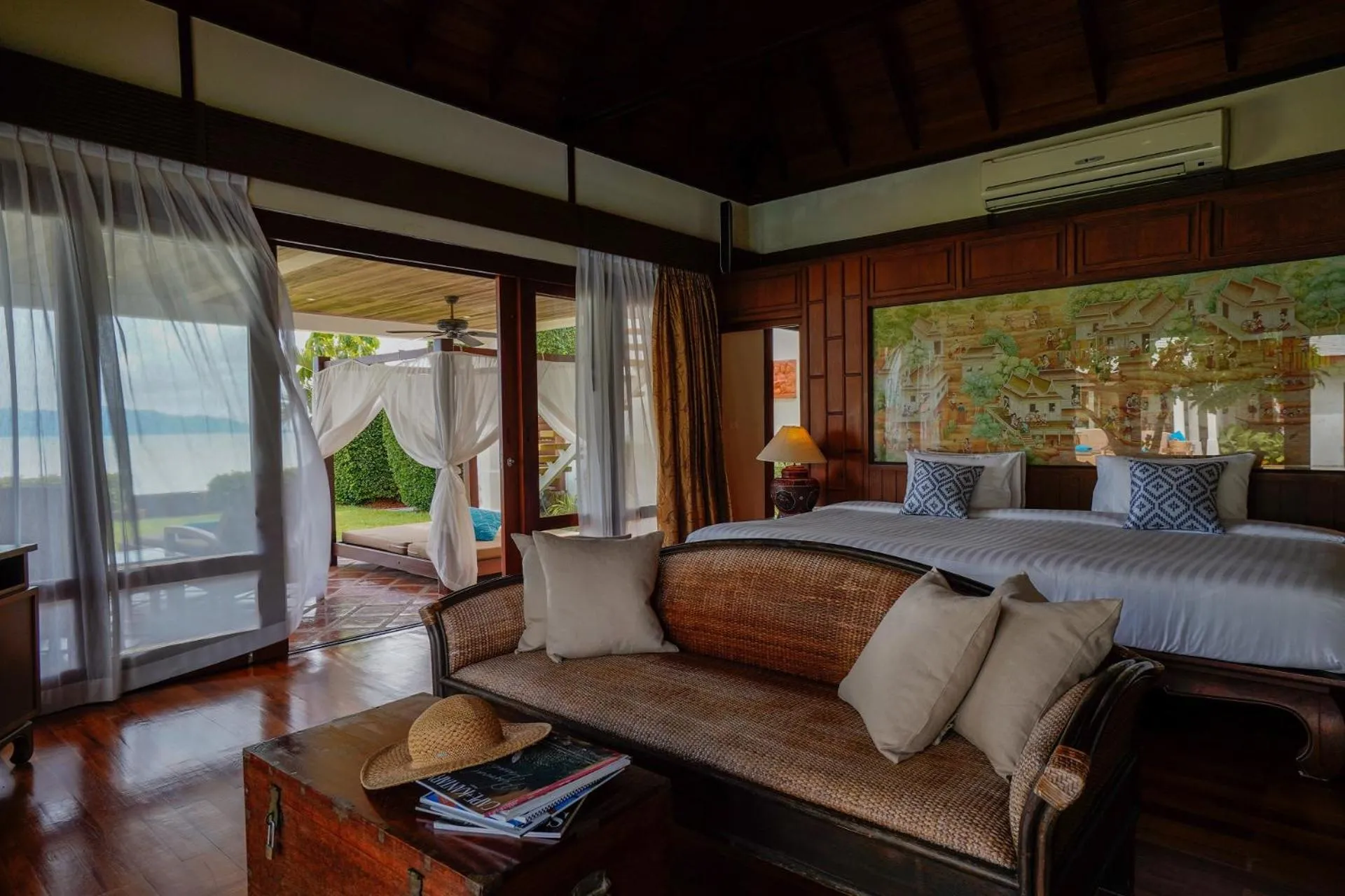 Bed in Miskawaan Beachfront Villas