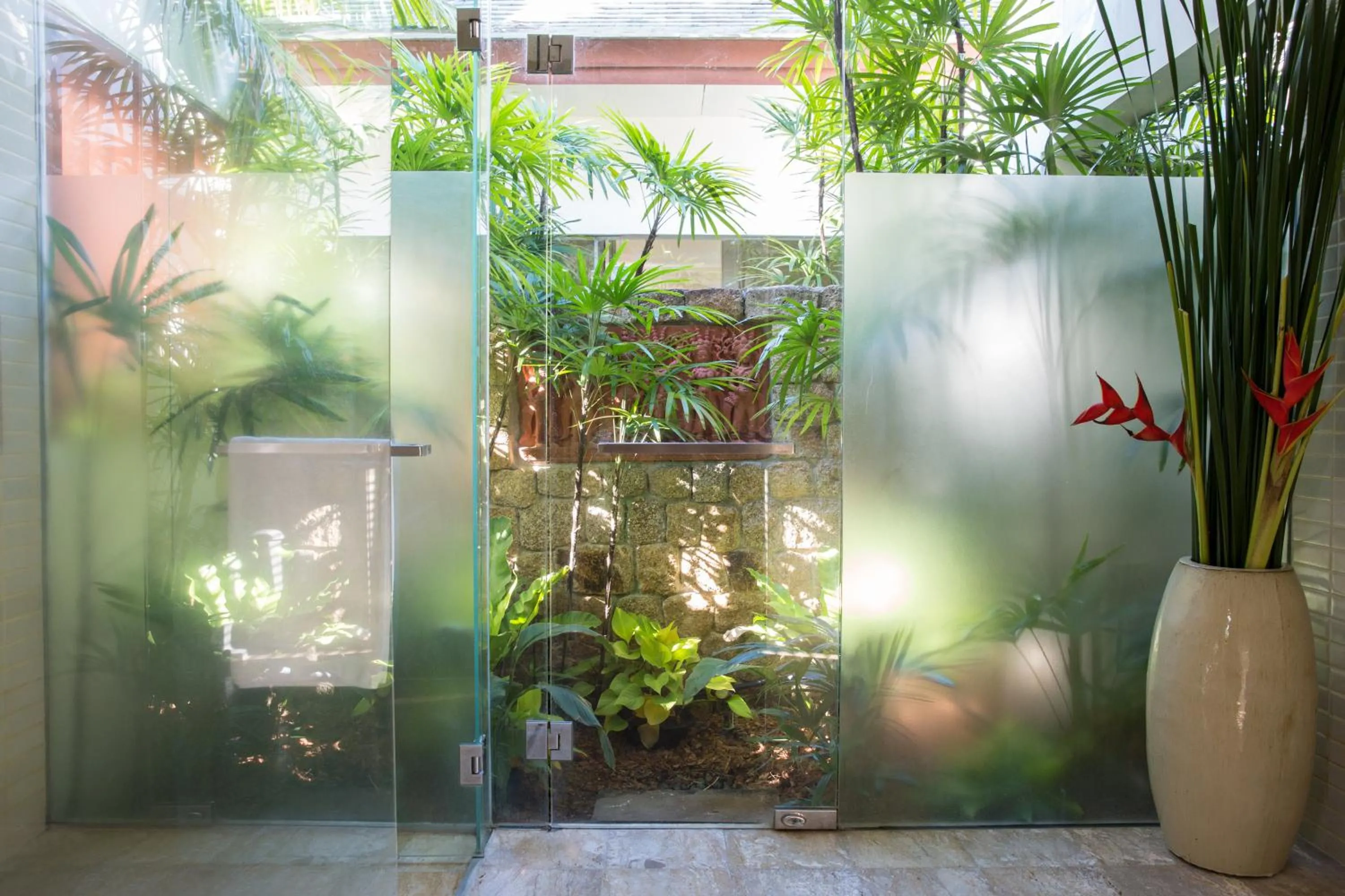 Shower in Miskawaan Beachfront Villas