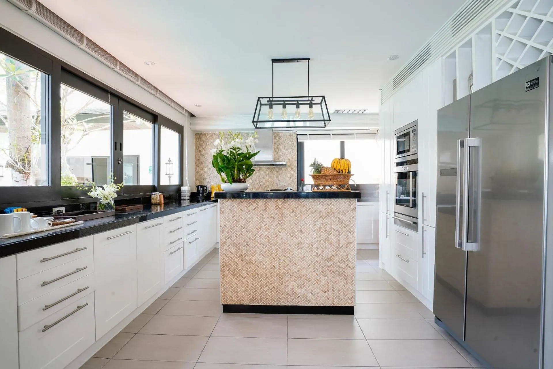 Kitchen or kitchenette in Miskawaan Beachfront Villas