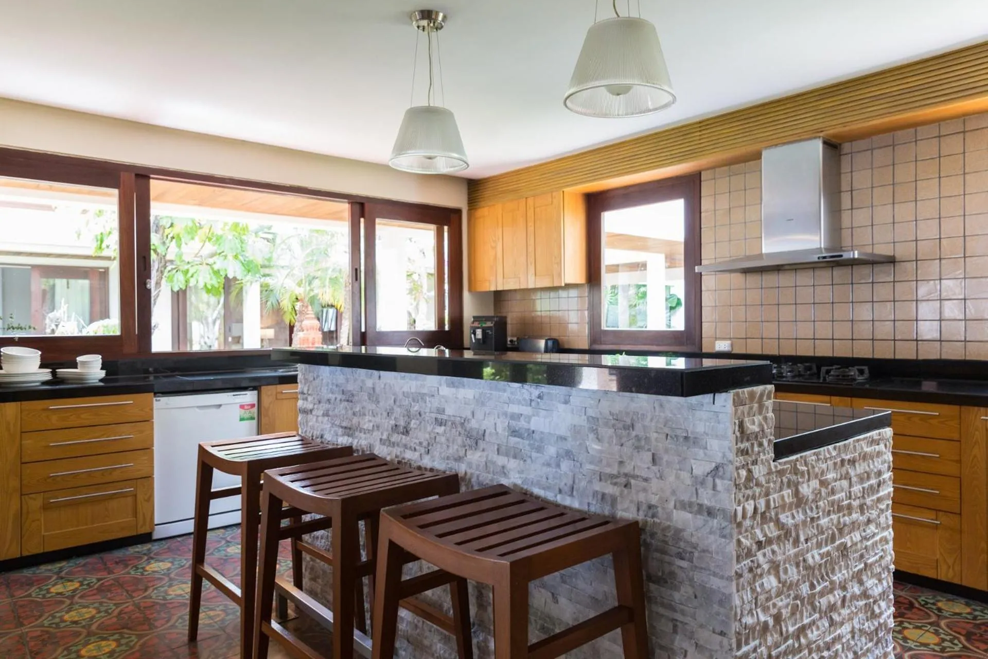 Kitchen or kitchenette in Miskawaan Beachfront Villas