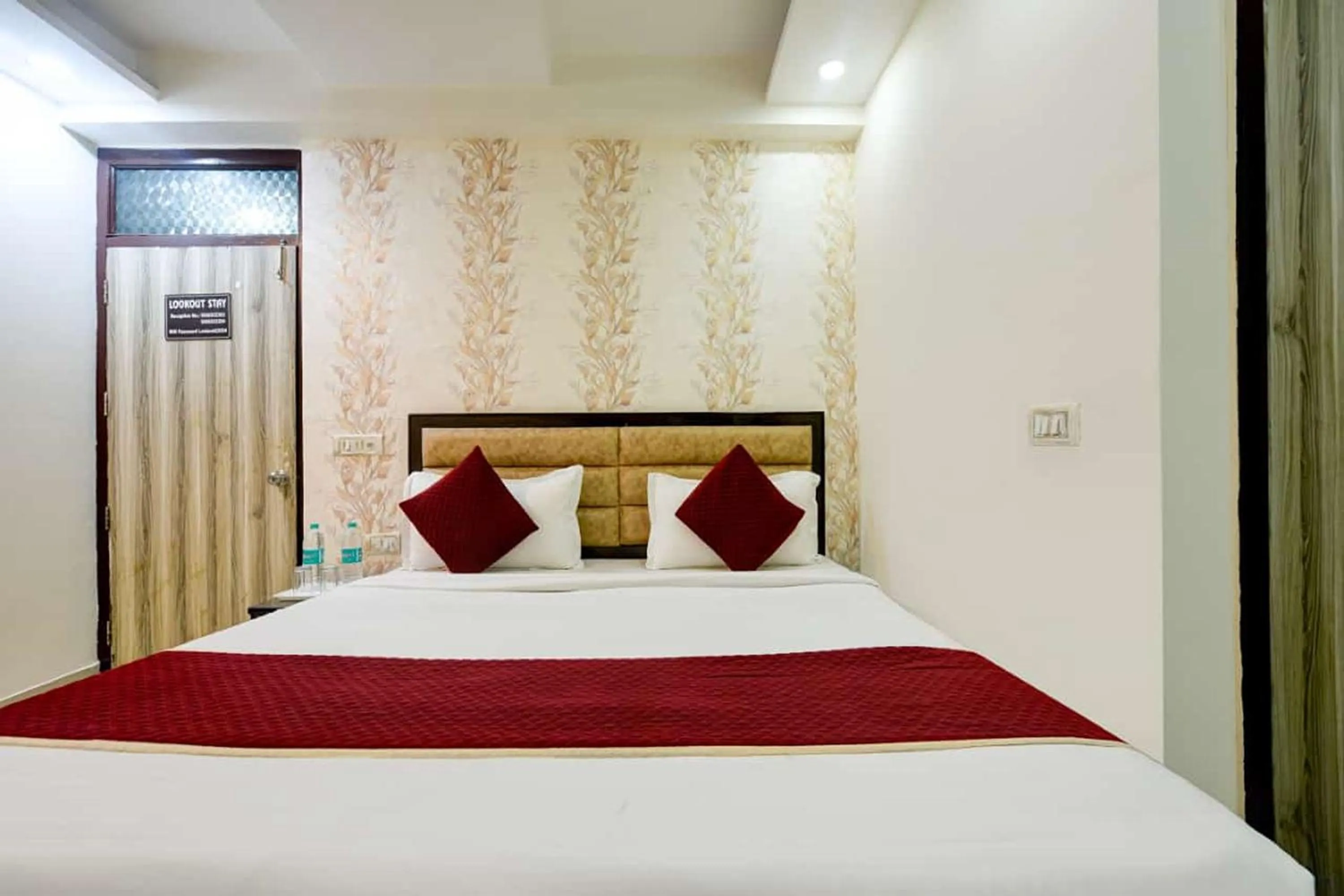 Photo of the whole room in Hotel Lookout Stay Delhi IGI Airport