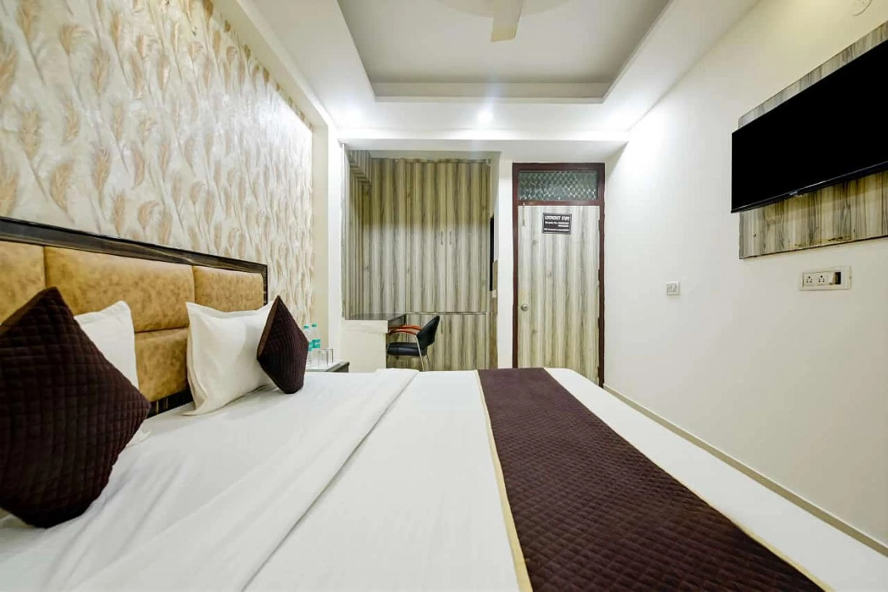 Photo of the whole room in Hotel Lookout Stay Delhi IGI Airport