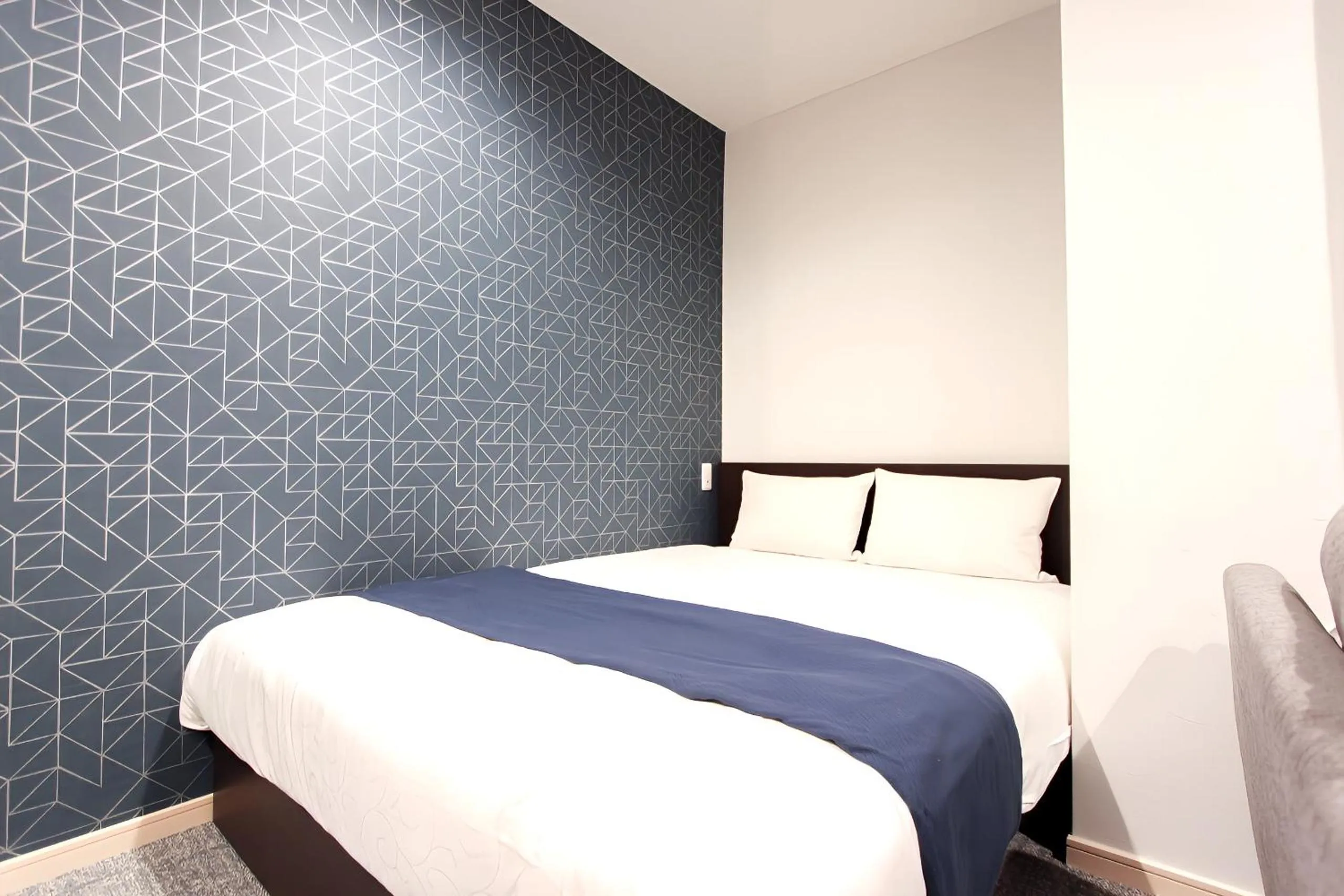 Bed in Hotel SALIFORT HAKATA