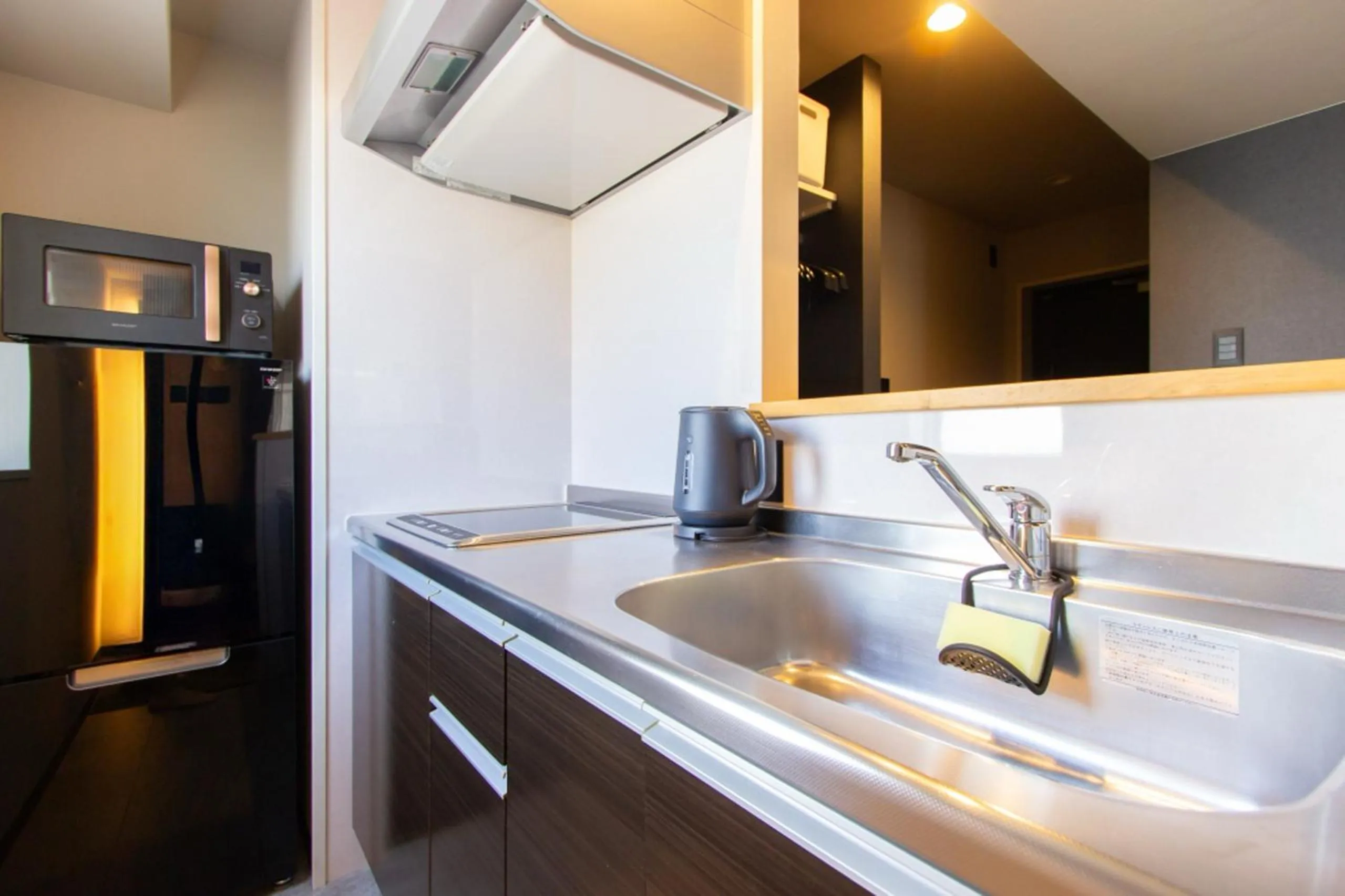 Kitchen or kitchenette in 慶 -Kei- HOTEL AND APARTMENT