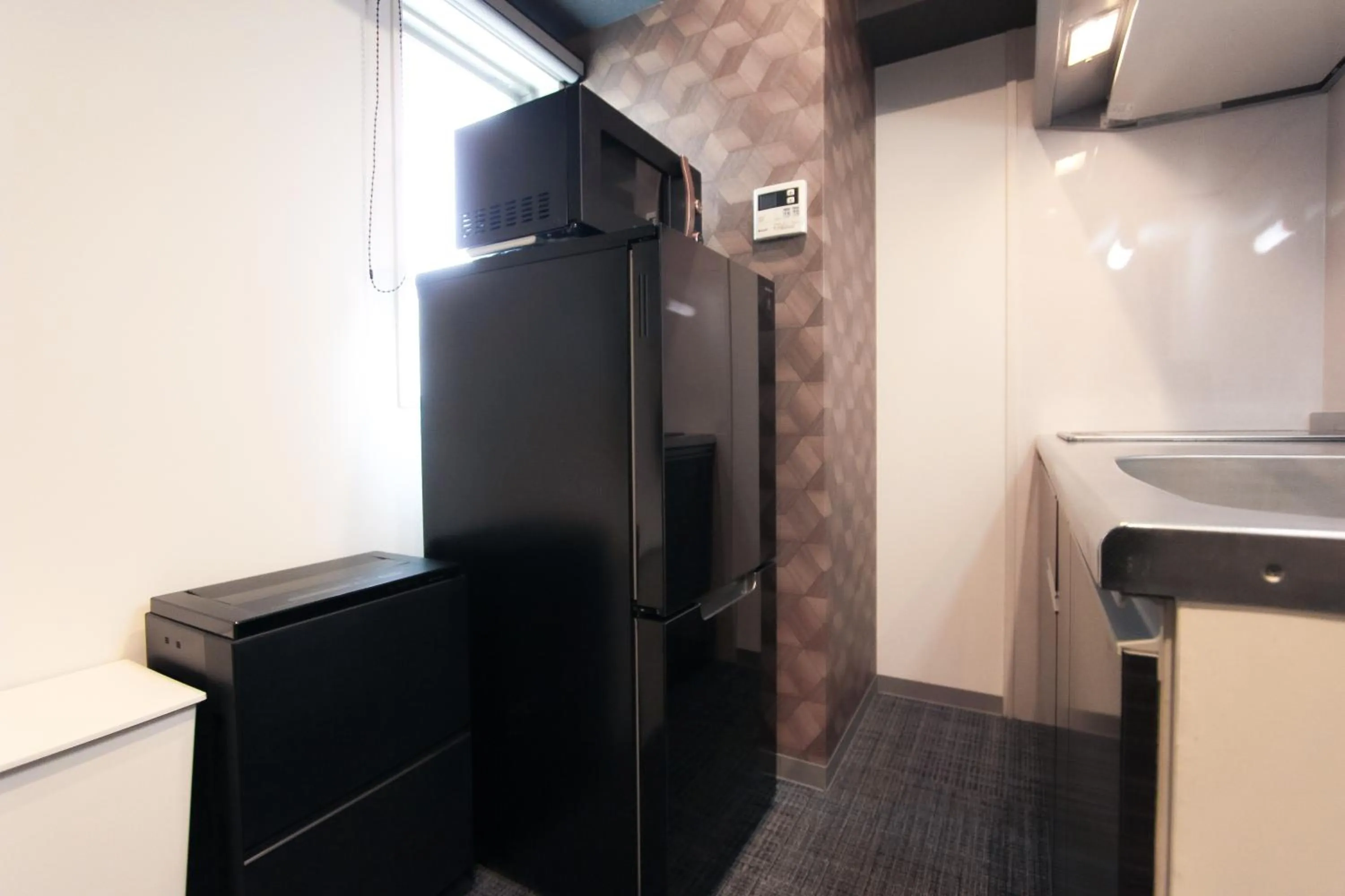 Kitchen or kitchenette in 慶 -Kei- HOTEL AND APARTMENT