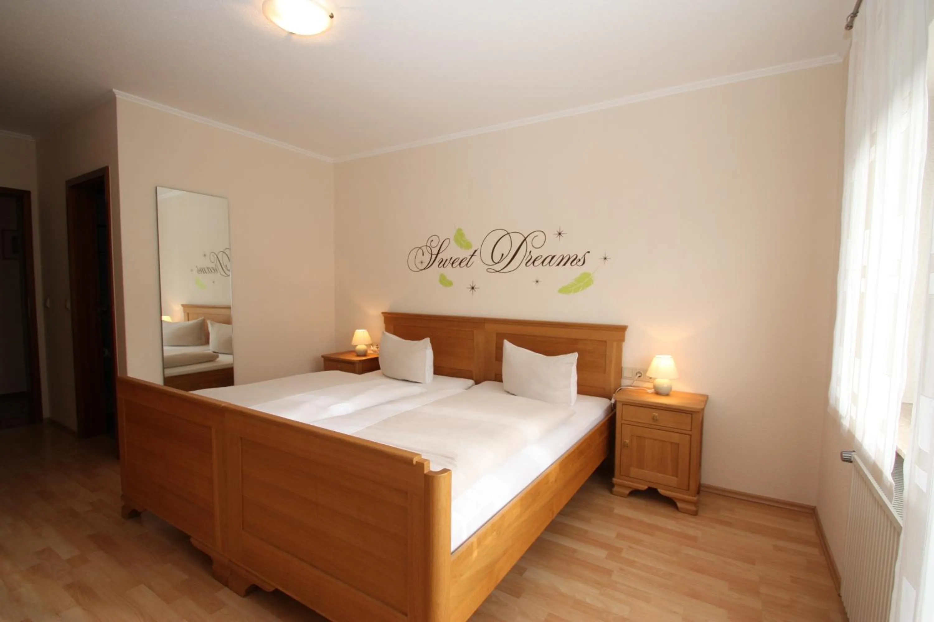 Photo of the whole room, Bed in Gasthaus Pension Geimer