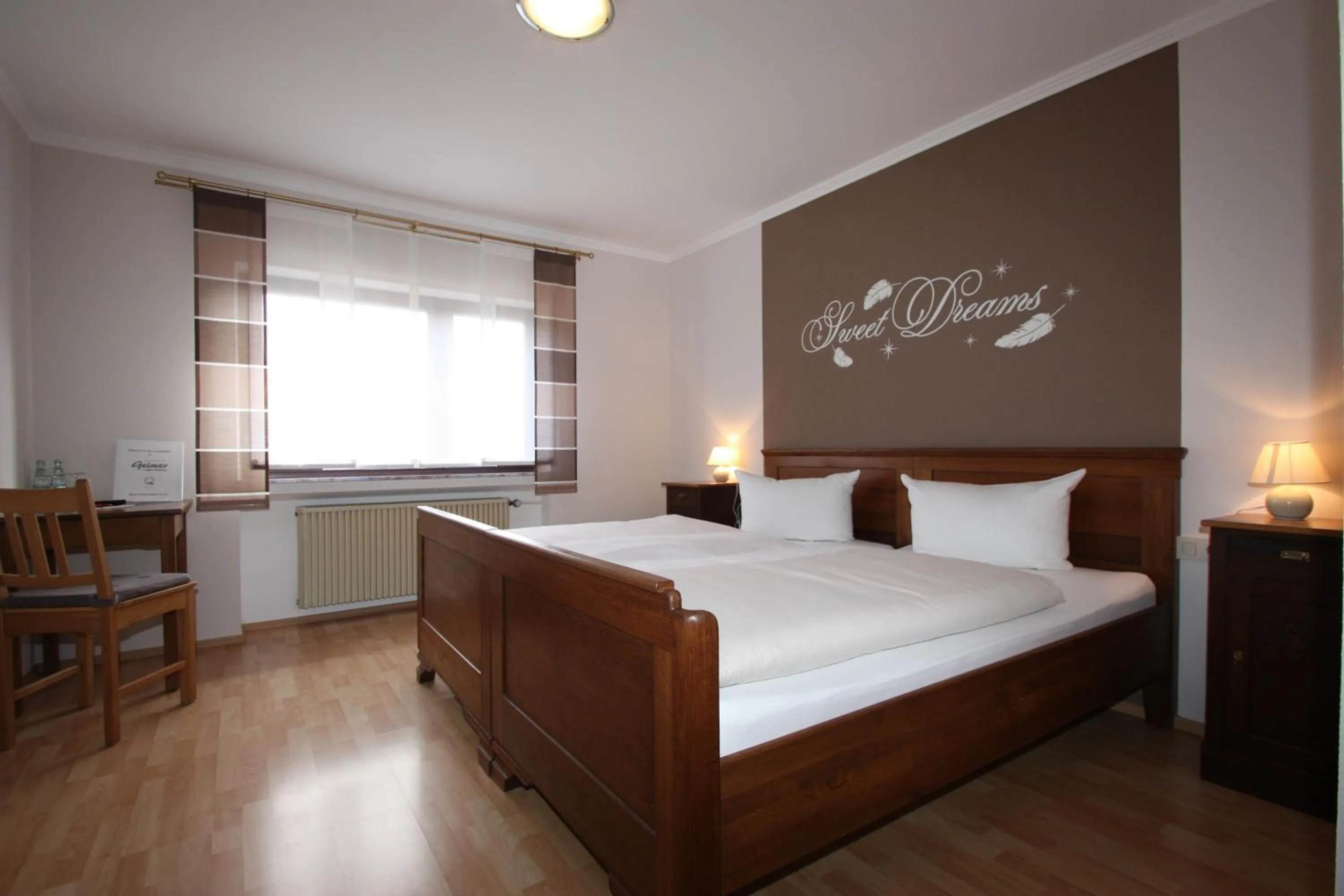 Photo of the whole room, Bed in Gasthaus Pension Geimer