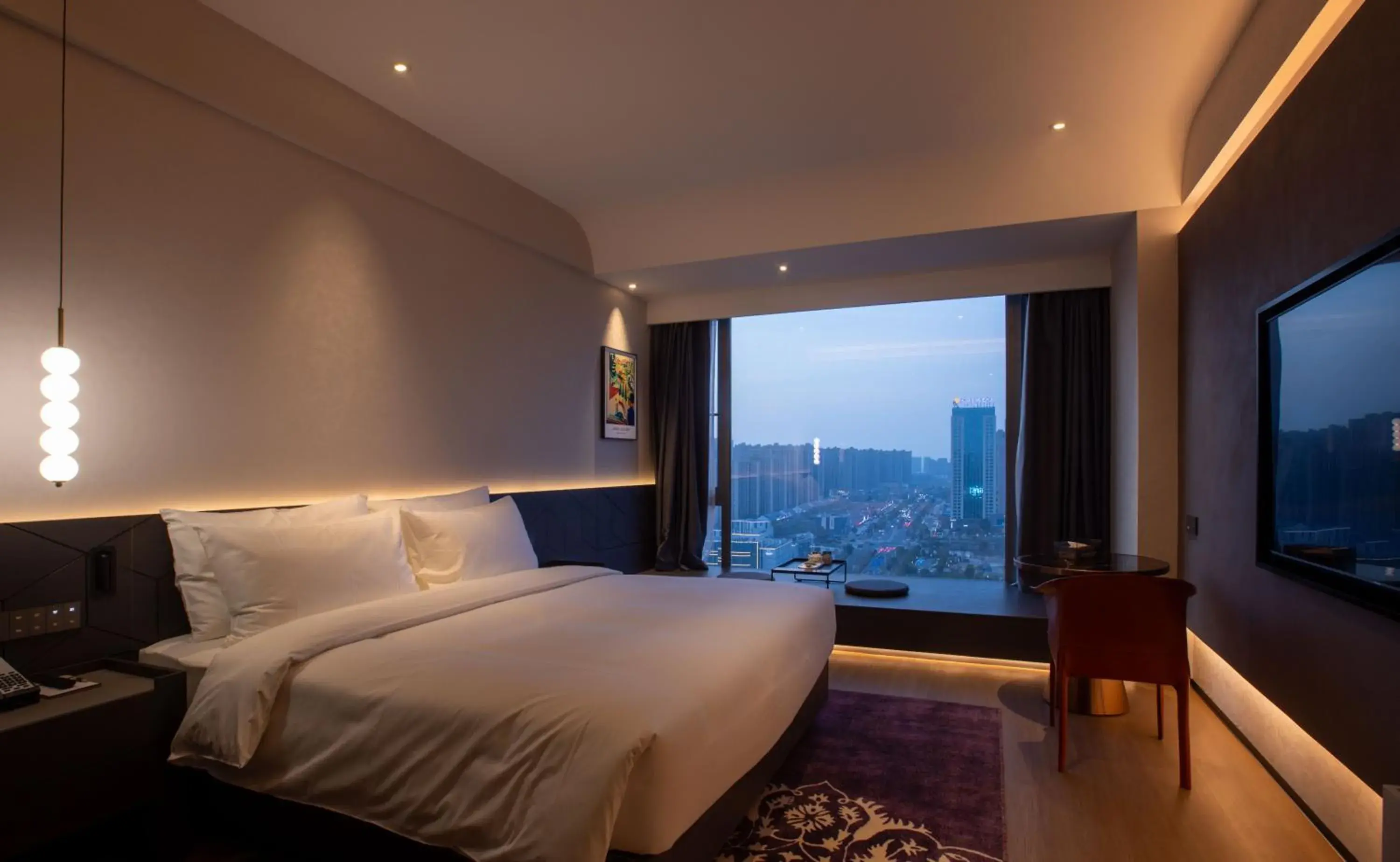 Bed in Maison New Century Hotel Cixi Hangzhou Bay Bed in Maison New Century Hotel Cixi Hangzhou Bay