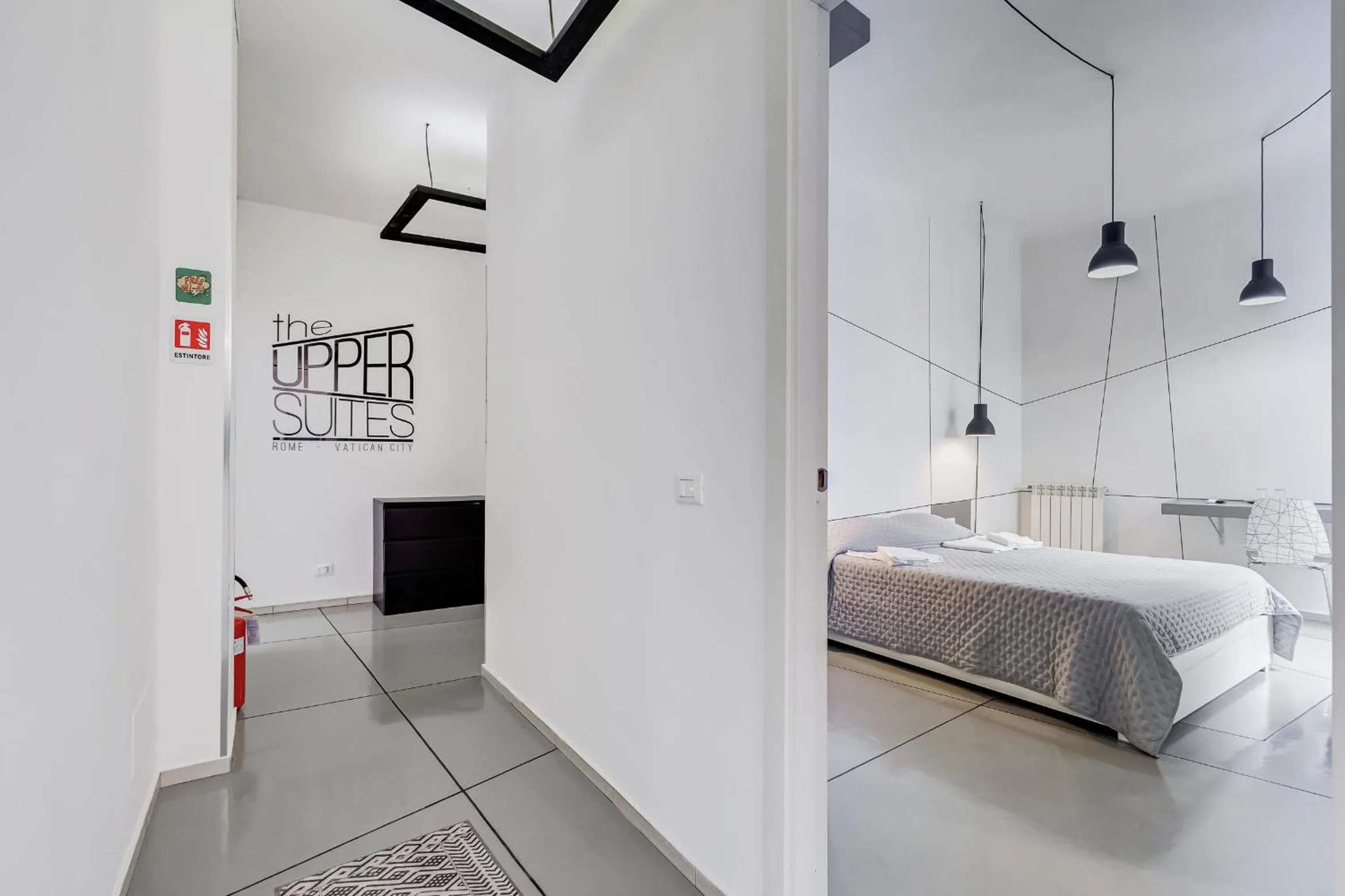 Seating area, Bed in The Upper Suites