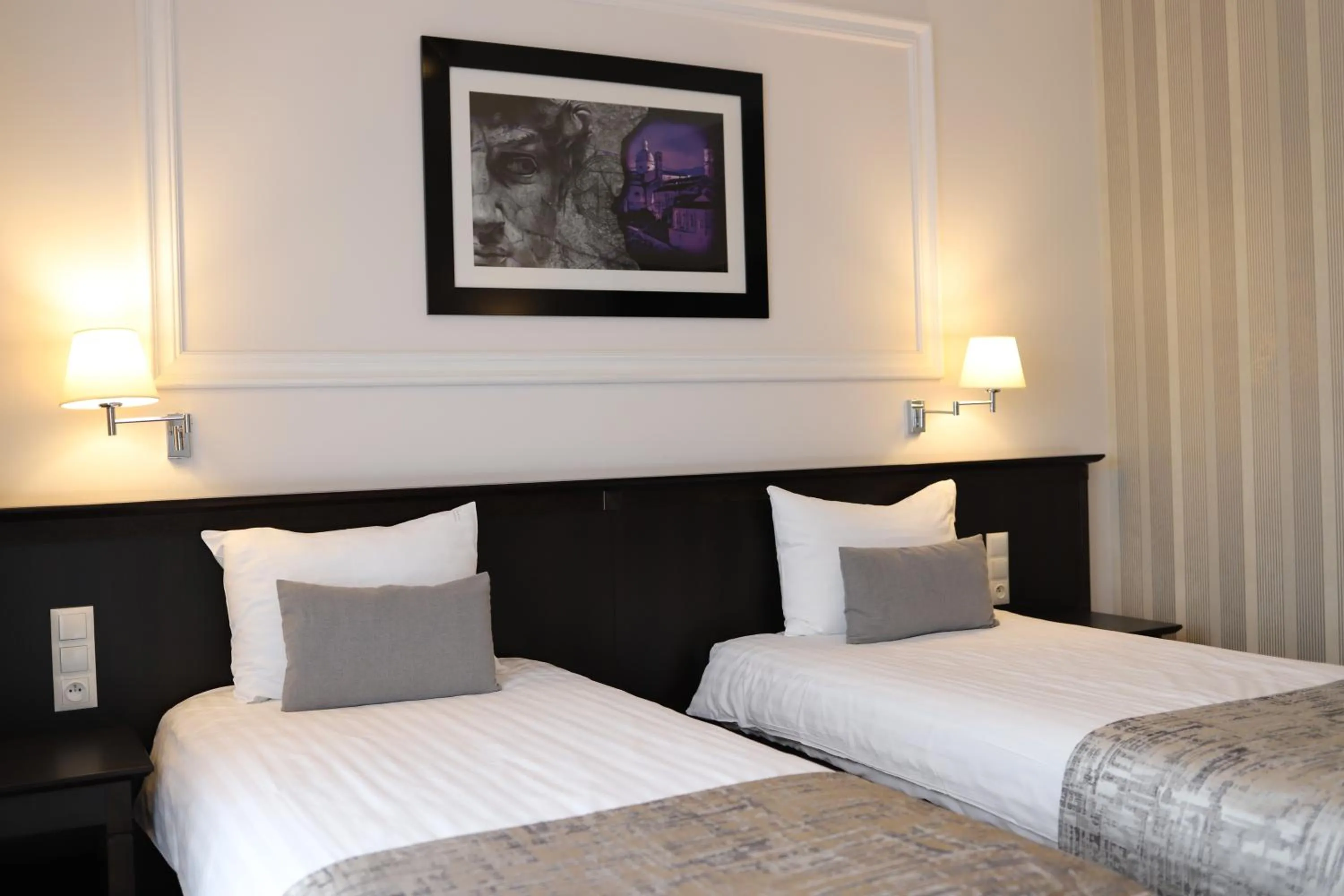 Bed in Hotel Toscania