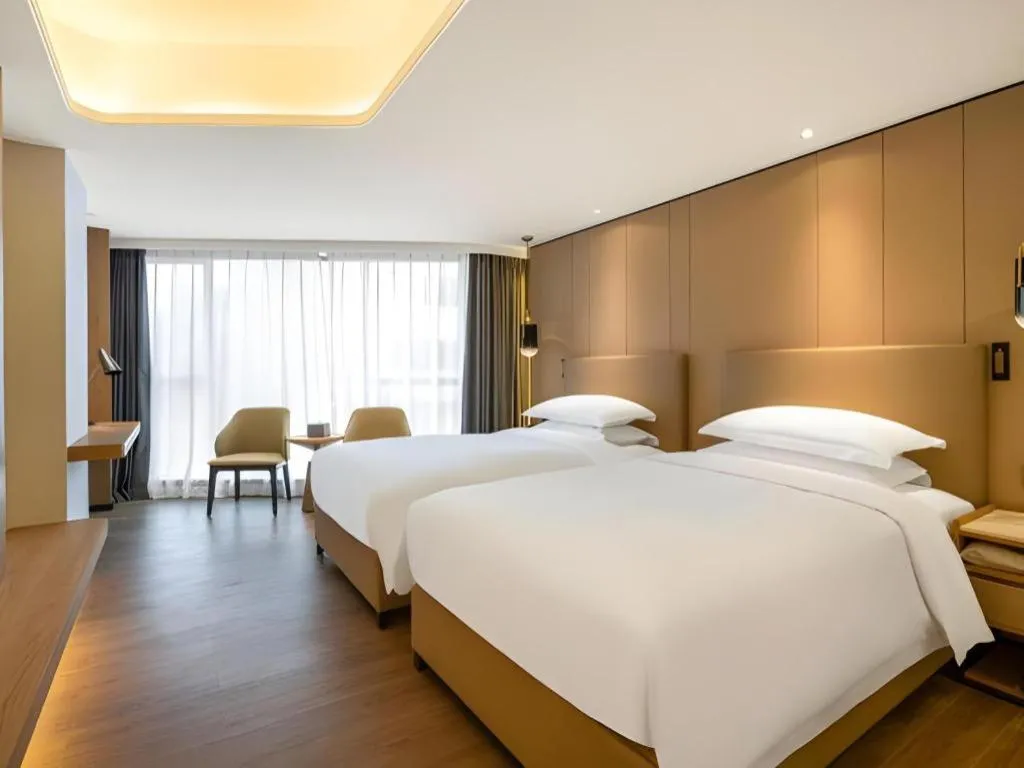 Bed in Shenzhen Hongfeng Hotel (Luohu Branch)