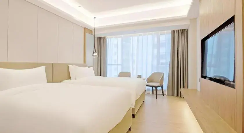 Bed in Shenzhen Hongfeng Hotel (Luohu Branch) Bed in Shenzhen Hongfeng Hotel (Luohu Branch)