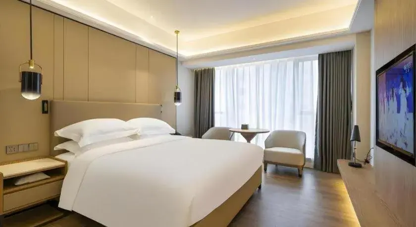 Bed in Shenzhen Hongfeng Hotel (Luohu Branch) Bed in Shenzhen Hongfeng Hotel (Luohu Branch)