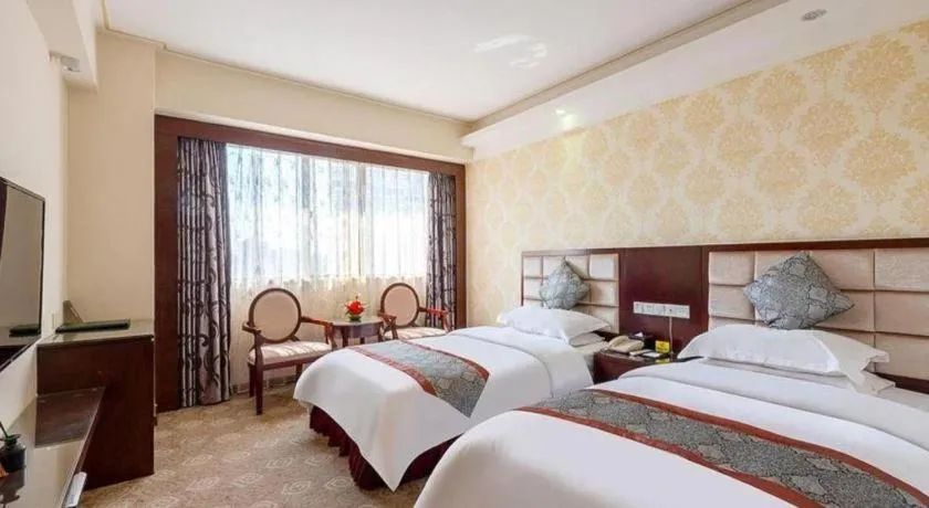 Bed in Overseas Chinese Hotel