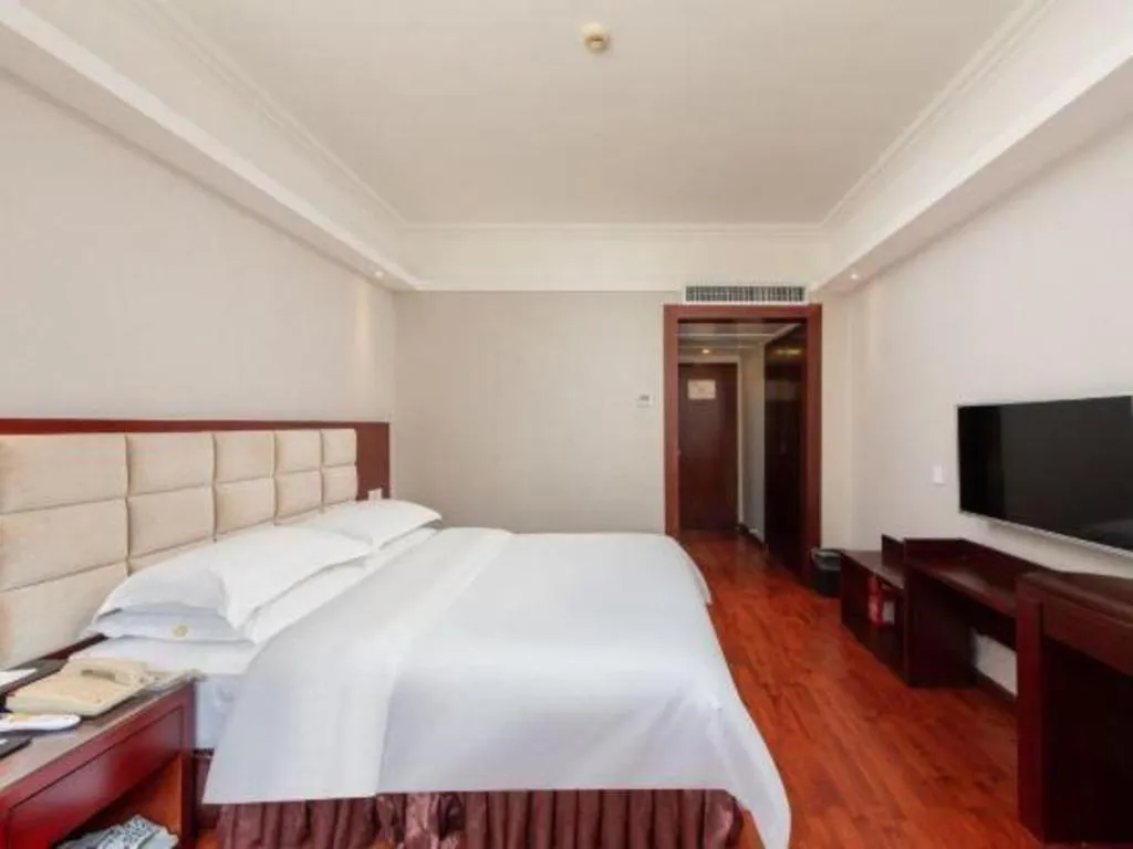 Bed in Overseas Chinese Hotel