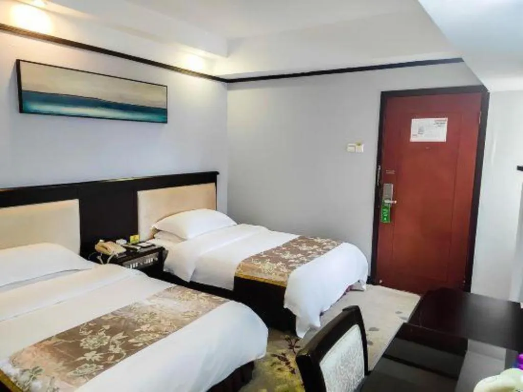 Bed in Overseas Chinese Hotel